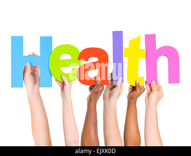 Multi-Ethnic Group of Diverse People Holding Letters To Form A Health Stock Photo