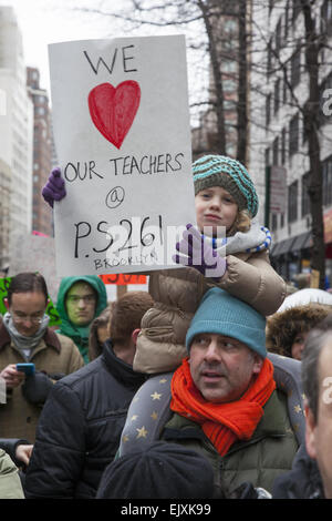 Large demonstration  at New York Governor's  office in NYC telling him to fund public education and support children  not Wall S Stock Photo