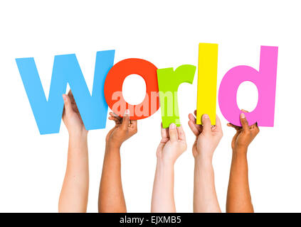 Multi-Ethnic Group Of People Holding The Word World Stock Photo