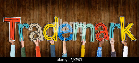 Group of Hands Holding Letter Trademark Stock Photo - Alamy