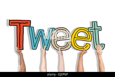 Group of Hands Holding Letter Tweet Stock Photo - Alamy