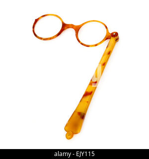 Vintage or antique blonde tortoise shell lorgnette, commonly used in the 19th and early 20th century at the opera and ballet. Stock Photo