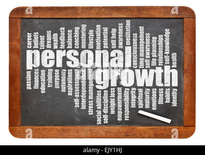 personal growth word cloud on a slate blackboard isolated on white Stock Photo