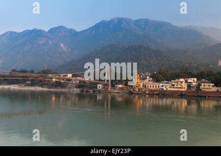 View of River Ganga and Ram Jhula bridge. Rishikesh Stock Photo