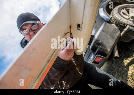 Kiev, Ukraine. 02nd Apr, 2015. Trainer repairs drone used for training Ukrainian soldiers to control unmanned aerial vehicle in the field at Training Center of Ukrainian Military Aerial Intelligence. Training Center is unique organization created for training Ukrainian soldiers controlling unmanned aerial vehicle and using them for aerial intelligence. Previously graduated soldiers are servicing now in 93rd Mechanized Brigade, Right sector, Battalion of Ukrainian Special Forces Azov. Kyiv, Ukraine. 2 of April. Photo of Oleksandr Rupeta. Credit:  Oleksandr Rupeta/Alamy Live News Stock Photo