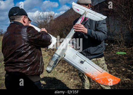 Kiev, Ukraine. 02nd Apr, 2015. Trainer and his student repair drone used for training Ukrainian soldiers to control unmanned aerial vehicle in the field at Training Center of Ukrainian Military Aerial Intelligence. Training Center is unique organization, created for training Ukrainian soldiers controlling unmanned aerial vehicle and using them for aerial intelligence. Previously graduated soldiers are servicing now in 93rd Mechanized Brigade, Right sector, Battalion of Ukrainian Special Forces Azov. Kyiv, Ukraine. 2 of April. Photo of Oleksandr Rupeta. Credit:  Oleksandr Rupeta/Alamy Live News Stock Photo