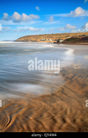 The beach at Perranporth on the North Coast of Cornwall, the image was captured at high tide in mid February. Stock Photo