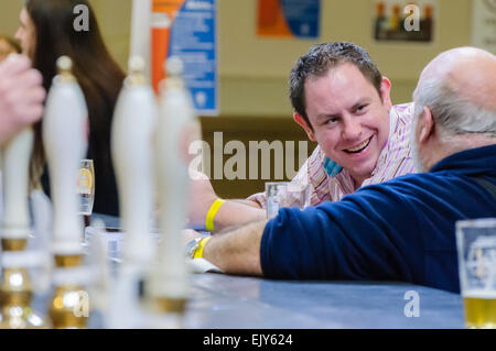 Men enjoying pints of beer at a CAMRA real ale festival. Stock Photo