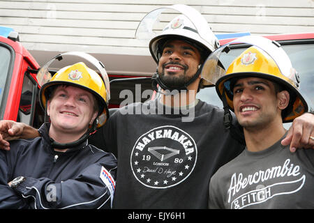 The official opening of a new community boxing gym at Moss Side Fire Station. L-R Ricky Hatton, David Haye and Amir Khan. Pictur Stock Photo