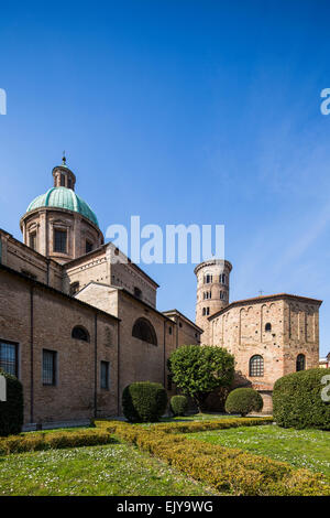 Exterior view of the early Christian baptistery, the bell tower and the neoclassical dome of Ravenna cathedral, Italy Stock Photo