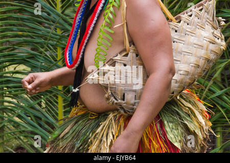 Yapese woman in traditional clothing carrying hand bag at Yap Day Festival, Yap Island, Federated States of Micronesia Stock Photo