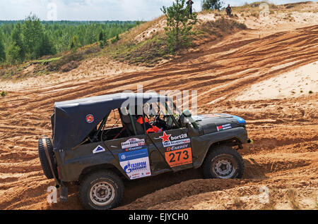 Races on a rally-raid on sandy dunes. Rally-raid Baha 'Belarus' 2014 - second day. Stock Photo