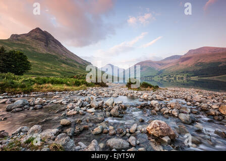 standing on the shores of Wastwater, the deepest lake in the lake district. Stock Photo