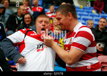 Wigan, UK. 03rd Apr, 2015. Super League Rugby. Wigan Warriors versus St Helens. Wigan and St Helens supporters engage in some friendly banter before kick off Credit:  Action Plus Sports/Alamy Live News Stock Photo