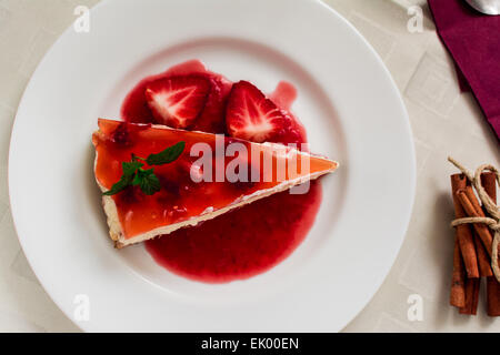 Italian traditional dessert cheesecake of ricotta with strawberry Stock Photo