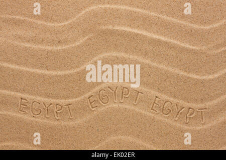 Egypt inscription on the wavy sand, as background Stock Photo
