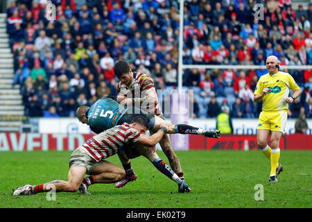 Wigan, UK. 03rd Apr, 2015. Super League Rugby. Wigan Warriors versus St Helens. Adam Swift of St Helens dives through a tackle Credit:  Action Plus Sports/Alamy Live News Stock Photo