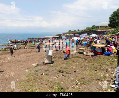 Local Congolese people gathering on the shore of Lake Kivu to buy fish, Goma, Democratic Republic of Congo ( DRC ), Africa Stock Photo