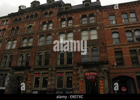 Red neon signs 'Buffet City' self-service Chinese Thai Restaurant, ground floor Gainsborough House, Portland Street, Manchester Stock Photo