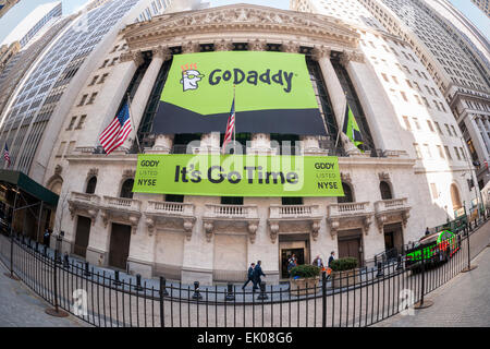 The New York Stock Exchange decorated for the first day of trading for the GoDaddy IPO on Wednesday, April 1, 2015. The 18 year-old technology company registers domain names, hosts websites and provides an assortment of technology services to individuals and small businesses. (© Richard B. Levine) Stock Photo