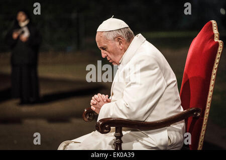 Rome, Italy. 03rd Apr, 2015. Pope Francis leads the Way of the Cross (Via Crucis) torchlight procession celebrated at the Colosseum on Good Friday in Rome, Italy. The Way of the Cross (Stations of the Cross or 'Via Crucis' in Latin) is part of the Easter tradition in Catholic countries. It takes place on Good Friday and commemorates the passion and death of Jesus Christ through the reading of prayers along a path of 14 stations. Credit:  Giuseppe Ciccia/Pacific Press/Alamy Live News Stock Photo