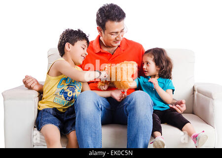 indian father and kids playing toy Stock Photo