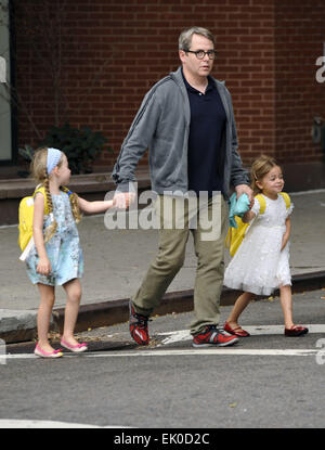 Matthew Broderick takes his twin daughters Marion and Tabitha to school Featuring: Matthew Broderick,Marion Loretta Elwell Broderick,Tabitha Hodge Broderick Where: New York City, New York, United States When: 29 Sep 2014 Stock Photo