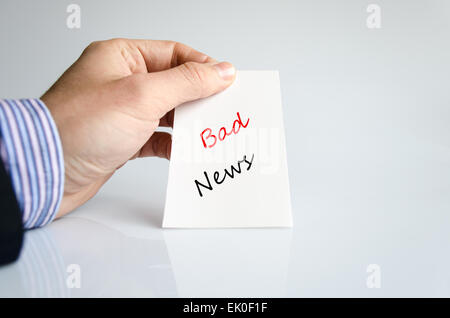 Business man hand holding business concept message bad news Stock Photo
