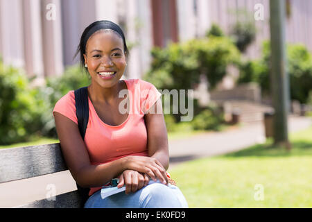 happy African American college student outside campus Stock Photo