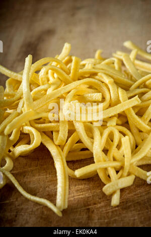 Close up of some noodles on wood background Stock Photo