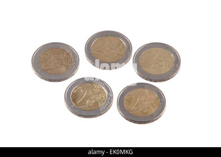 Close up photo Euro coins on a plain white background. Stock Photo