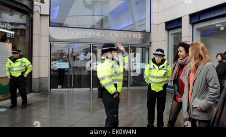 Brighton, UK. 4th April, 2015. Police at the front entrance to Churchill Square Shopping Centre in Brighton which had to be evacuated after a fire broke out in one of the car parks   Credit:  Simon Dack/Alamy Live News Stock Photo