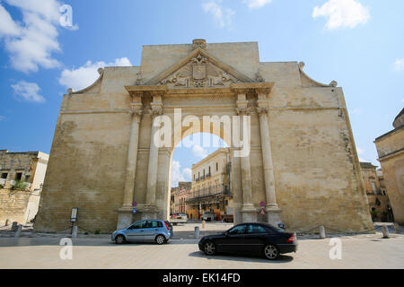 LECCE, ITALY - MARCH 13, 2015: The triumphal arch, commonly known as Neapolitan Gate or Porta Napoli in Lecce, Apulia, Southern Stock Photo