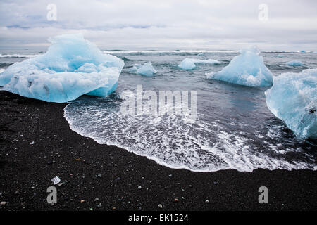 View of the ocean with icebergs near the Jokulsarlon glacial lagoon in south Iceland Stock Photo