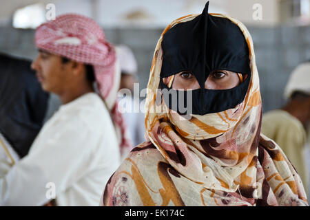 Bedu (Bedouin) people at animal market in Sinaw, Oman Stock Photo