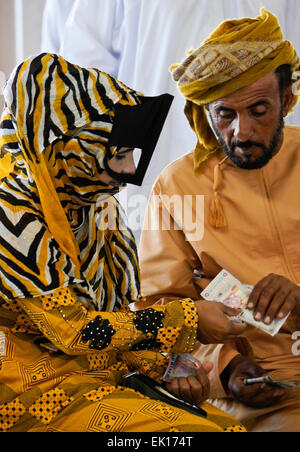 Bedu (Bedouin) people at animal market in Sinaw, Oman Stock Photo