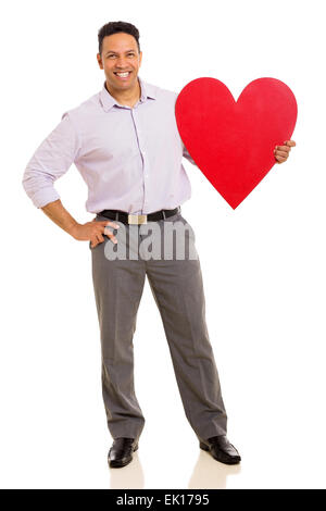 handsome middle aged businessman holding red heart symbol on white background Stock Photo