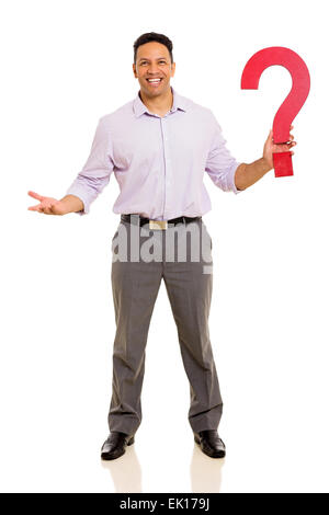 middle aged businessman holding question mark isolated on white background Stock Photo