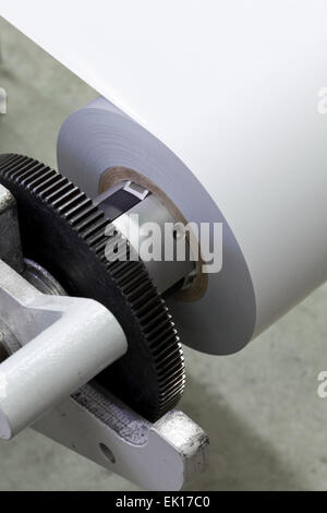 roll paper on printing machine close up Stock Photo