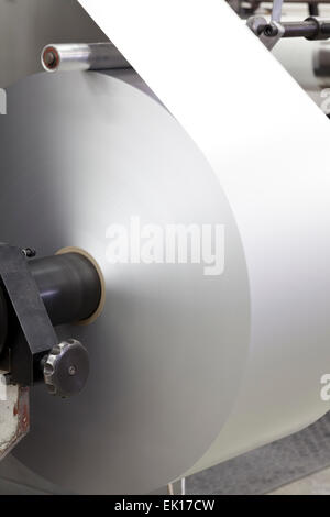 roll paper on printing machine close up Stock Photo