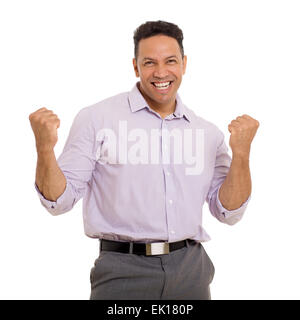 cheerful middle aged man holding fists on white background Stock Photo