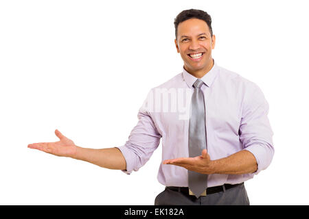cheerful middle aged man presenting empty space isolated on white Stock Photo