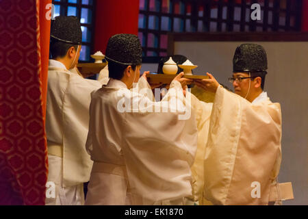 Priests at Itsukushima Shrine during Kangen-sai Festival, Miyajima, Japan Stock Photo