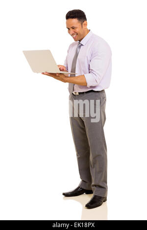 happy middle aged man using laptop on white background Stock Photo