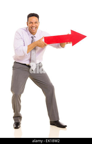 funny middle aged man pointing with arrow sign on white background Stock Photo