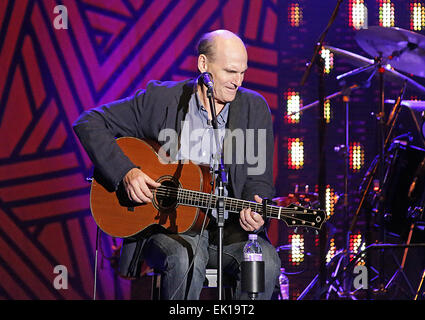 James Taylor performing live on stage at Manchester Phones4U Arena Featuring: James Taylor Where: Manchester, United Kingdom When: 30 Sep 2014 Stock Photo