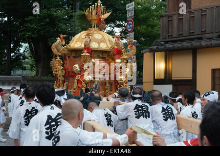 Parade carrying shrine during Kyoto Gion Matsuri, Kyoto, Japan Stock Photo