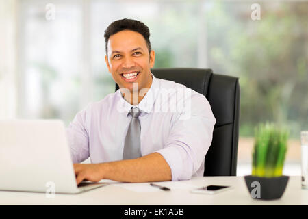 successful businessman using laptop computer in office Stock Photo