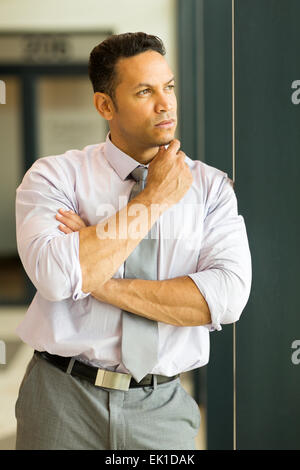 thoughtful businessman in modern office Stock Photo