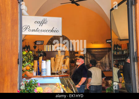 FLORENCE, ITALY - MAY 08, 2014: Visitors to the cafe gelato in Florence. Italy Stock Photo